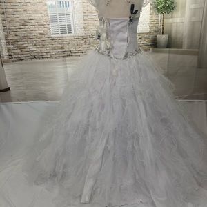 Description: Embellished off the shoulder ruffled tiered layer dress.Quinceanera